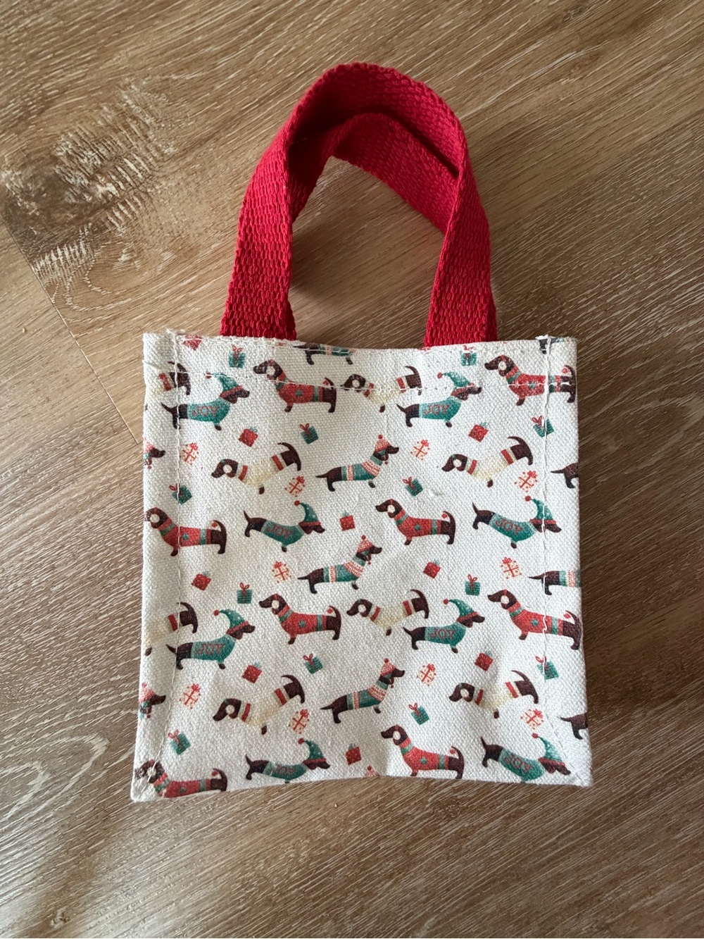 Dachshund holiday bag with red handles